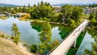Arial shot of bikers pedaling across a bridge in North Idaho