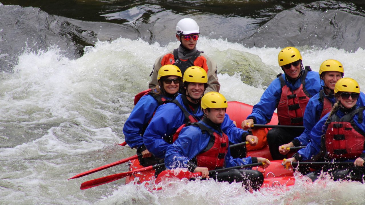 Upstream angle of a group of paddlers and their guide on the Lochsa River