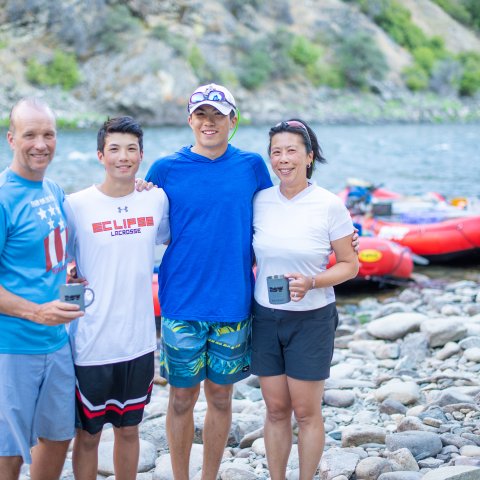 A family of four on a guided rafting trip in Idaho