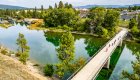 Birds eye view of bikers going over a bridge on the Centennial Trail in Northern Idaho