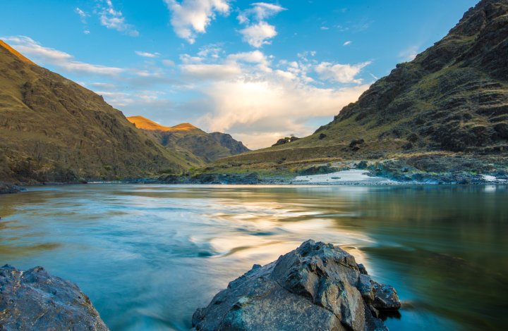 Water level shot looking downstream on the Lower Salmon River at golden hour