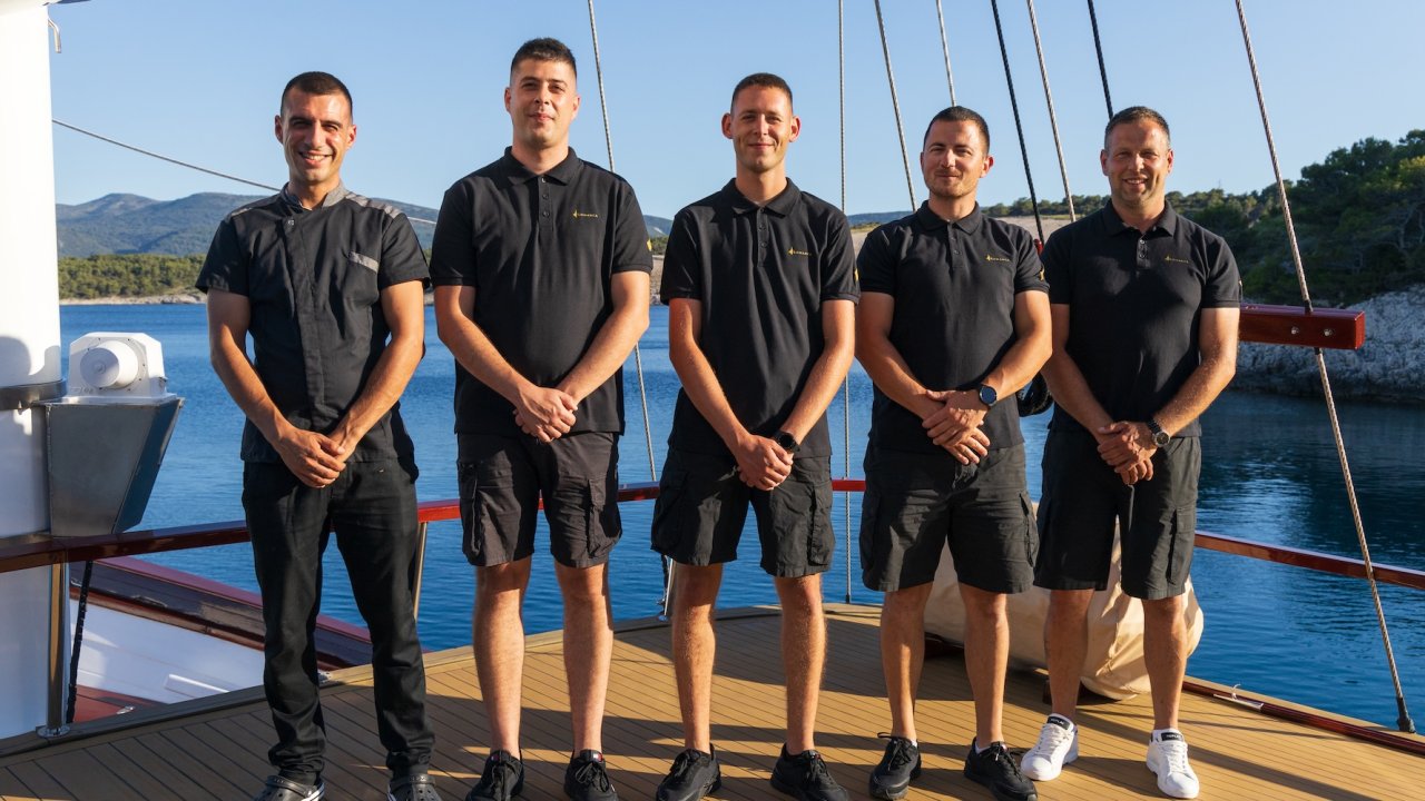 people on deck of sailing yacht in croatia