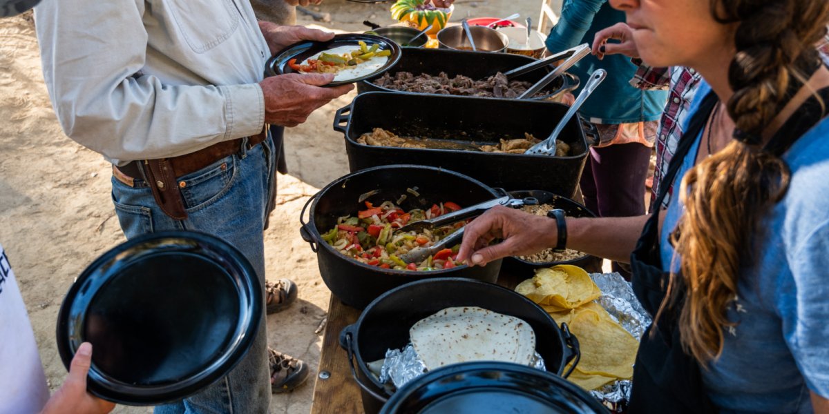 ROW guests' navigate their way through the Dutch Oven buffet line