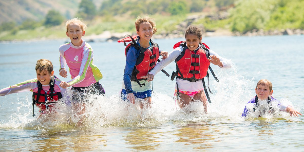 group of kids on the river