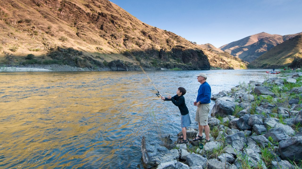 father and son fly fishing