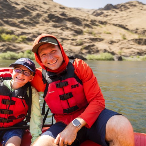 Dad and son rafting the lower Salmon River in Idaho
