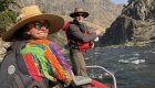 A fly fishing guide rowing a fisherman down the Middle Fork Salmon River as they fly fish