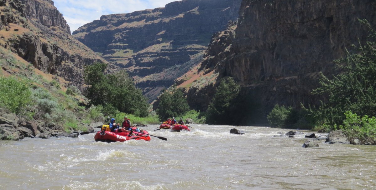 ROW Adventures boat moving downstream on the Jarbridge/Bruneau River