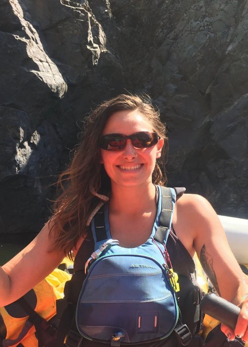 Female river guide in PFD