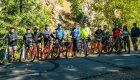 A group of people standing on their bikes in Idaho on a sunny day