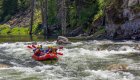 lochsa river in idaho with red rafts on it