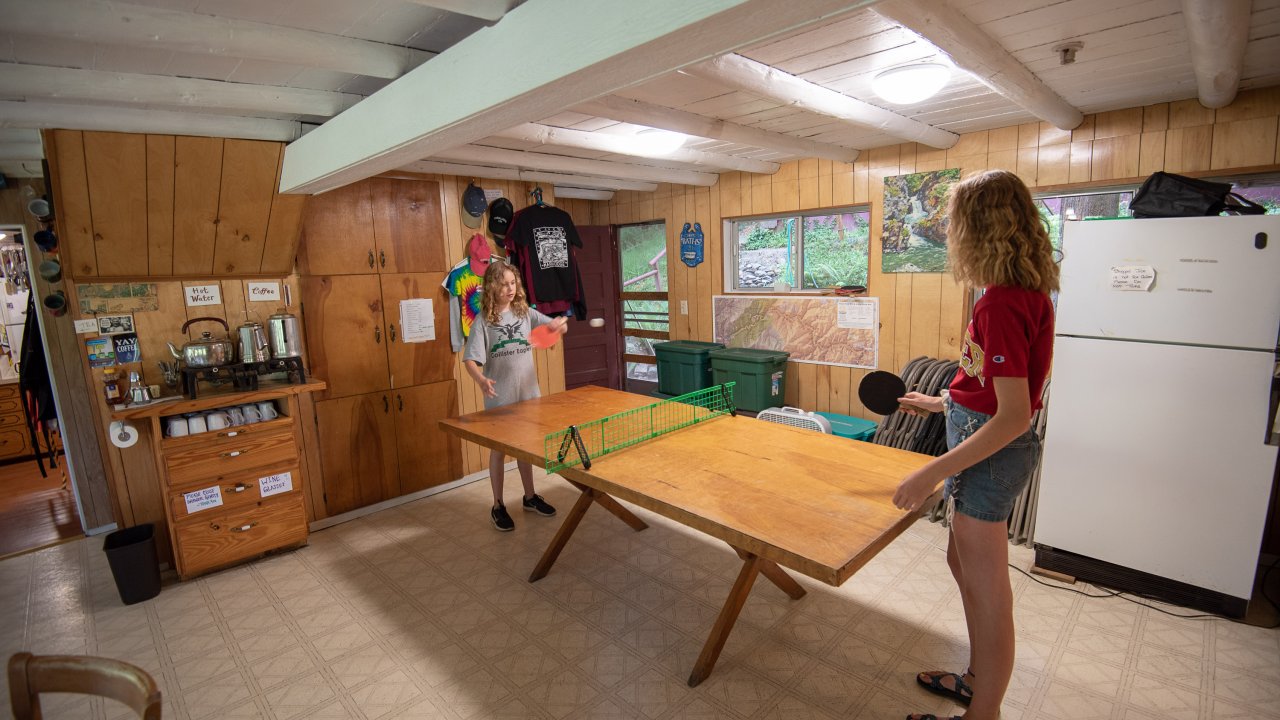 Two guests playing ping pong at Marial Lodge in Oregon