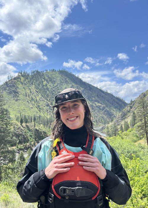 ROW employee smiling at an overlook in Idaho.