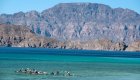 Sea Kayakers amongst the desert landscape of Loreto Bay National Park