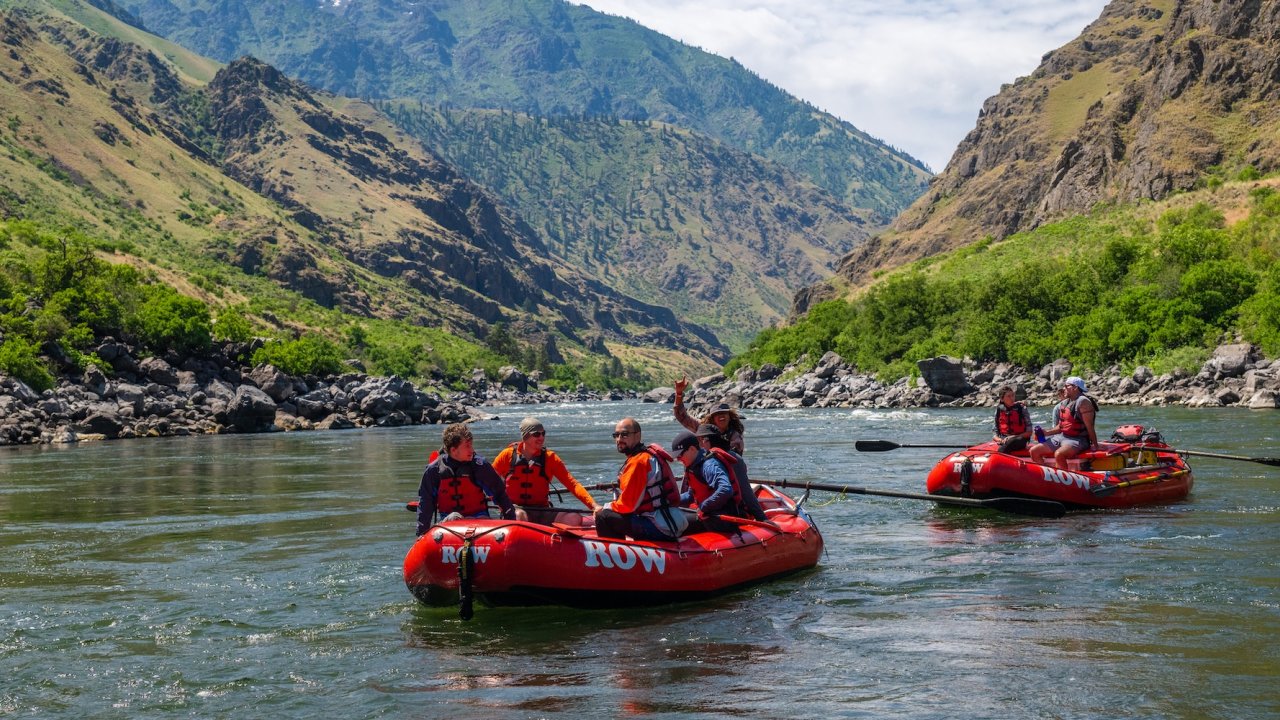 Outfitted multi-day rafting trip through Hells Canyon Snake River on a sunny day