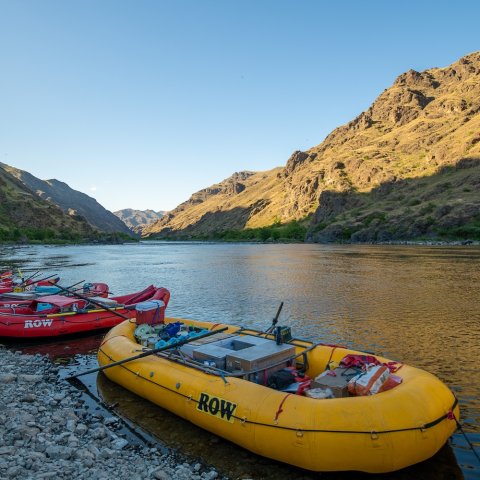 Two whitewater rafts in water of the Snake River in Hells Canyon. 