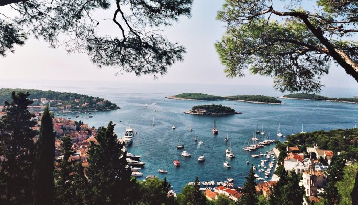 A row of traditional wooden gulets in a harbor in Croatia